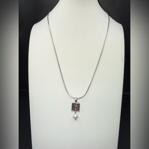 Chic Silver Necklace with Pearl and Swirl Pendant